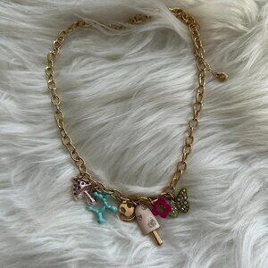 Gold whimsical charm necklace